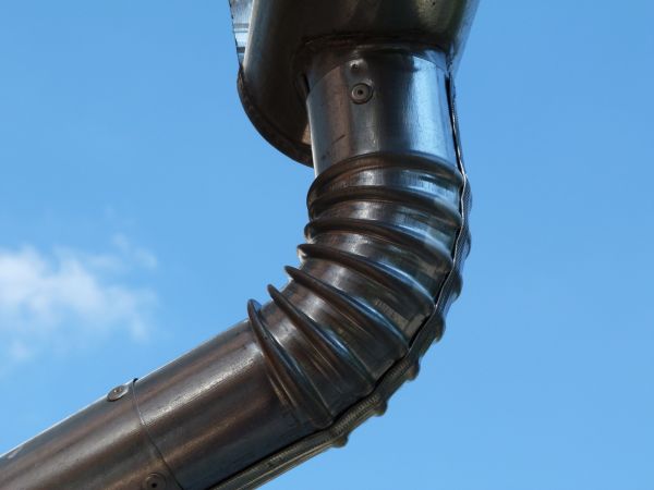 Metal Downspout Installation in Granger