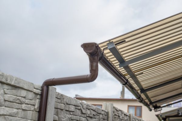 Plastic Downspout Installation in Granger